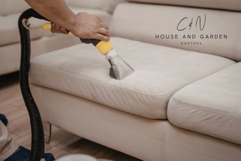 Steam cleaning a cream leather sofa