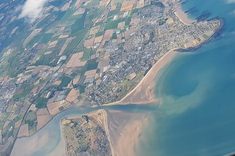Rush from the air, with its beaches and the fields around the town